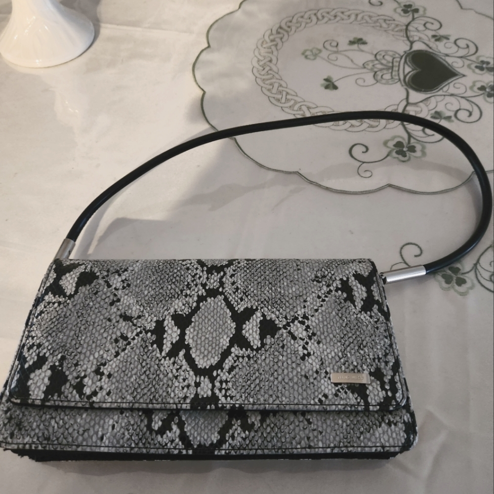 Ladies pocketbook with shoulder strap  black and white fax sake skin retro
